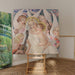 Reproductie van het schilderij De Madonna met Kind, omringd door muzikale engelen - Gerda Wegener