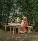 The artist's wife in the tree - Gerhard Munthe — artwork view
