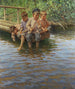 van Vier jongens op de kade tijdens het vissen - Nikolay Bogdanov-Belsky — weergave van het kunstwerk