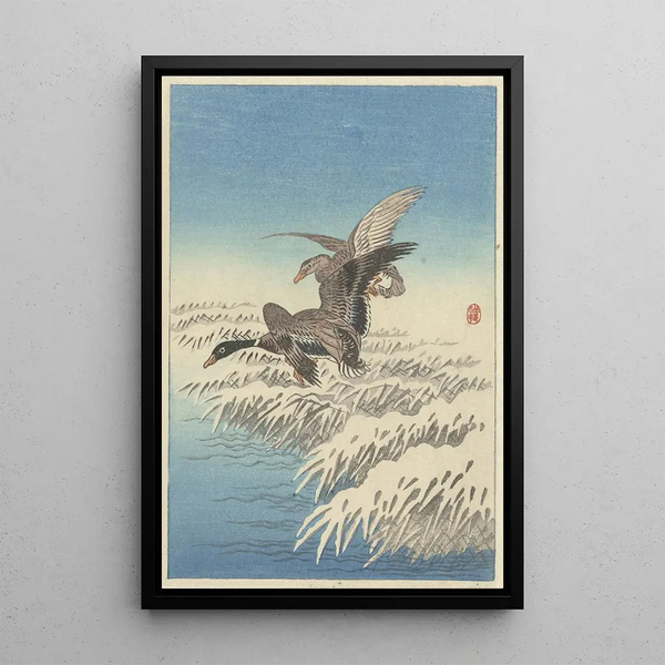 Duck Flight over Snowy Reeds - Ohara Koson — framed artwork on a wall