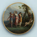 van een schilderij met drie dansende nimfen en een Cupido liggend in een landschap - Antonio Zucchi — gepresenteerd in een interieur