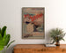 Vintage Brittany poster – Brittany Beaches, Orléans, framed above a wooden dresser, between plants.