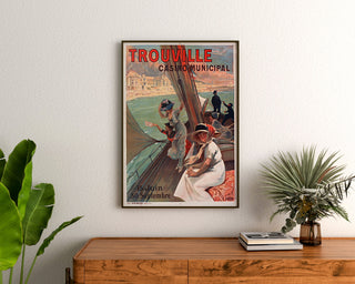 Vintage Normandy – Trouville poster, Casino Municipal, framed above a wooden dresser between plants.