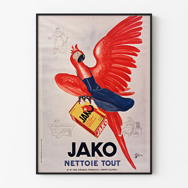 Vintage reclameposter Jako nettoie tout, gepresenteerd in een smal lijstje tegen een lichte muur.
