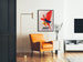 Vintage reclameposter Jako nettoie tout, ingelijst in een woonkamer met een oranje fauteuil en een staande lamp.