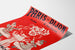 Vintage advertising poster Paris–Dijon, toys and holiday gifts, shown on a curled sheet, perspective view.