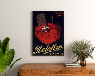 Vintage reclameposter Relskyr - 1° Kumel, ingelijst boven een houten dressoir, tussen planten.