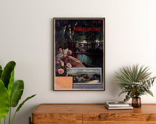 Vintage tourist poster – Pougues-les-Eaux, PLM, framed above a wooden dresser, between plants.