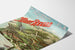 Vintage poster Aix-les-Bains, Mont-Revard, crémaillère, gepresenteerd op een gebogen blad, perspectivisch gezien.