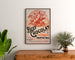 Vintage poster Beef Chocolat, chocolaterie de la Drôme, ingelijst boven een houten ladekast, tussen planten.