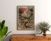 Vintageposter Cannes, Grand Hôtel des Pins, ingelijst boven een houten dressoir tussen planten.
