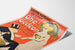 Vintage Casino Kursaal “Ohé Gédéon” poster shown on a curved sheet, viewed in perspective.