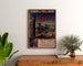 Vintage affiche Coucy, Chemins de Fer du Nord, ingelijst boven een houten dressoir, tussen planten.