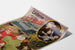 Vintage Laiterie de l’Isle Briant, Angers poster, presented on a curved sheet, perspective view.