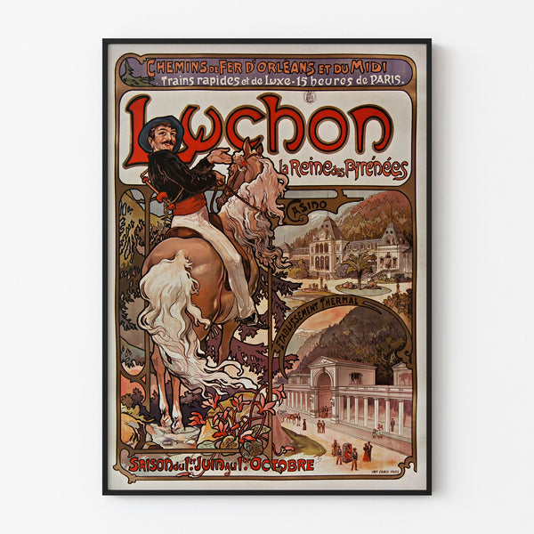 Vintage Luchon poster, the queen of the Pyrenees, displayed in a thin frame on a light wall.