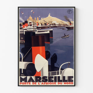 Vintageposter Marseille, Porte de l’Afrique du Nord, in een slank lijstje aan een lichte muur.