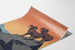 Vintage poster National Parks Preserve Wild Life, gepresenteerd op een gebogen vel, perspectivisch weergegeven.
