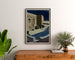 Vintage Orange poster, Roman theatre PLM, framed above a wooden dresser, between plants.