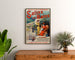 Vintage Salins-les-Bains (Jura) poster, framed above a wooden dresser between plants.