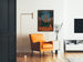 Vintage poster Thann, industriële expositie, ingekaderd in een woonkamer met een oranje fauteuil en een staande lamp.