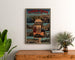 Vintageposter Thonon‑les‑Bains, ingelijst boven een houten dressoir tussen planten.