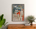 Vintage Vernet-les-Bains Canigou poster, framed above a wooden dresser, between plants.