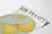 Vintage Air France poster met vluchtreserveringskaart