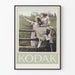 Vintage Kodak poster met jonge vrouwen en camera