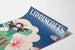 Vintage poster Lippincott's juli met vrouw en vuurwerk