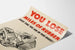 Vintage poster over bewustwording van band- en rubberbesparing